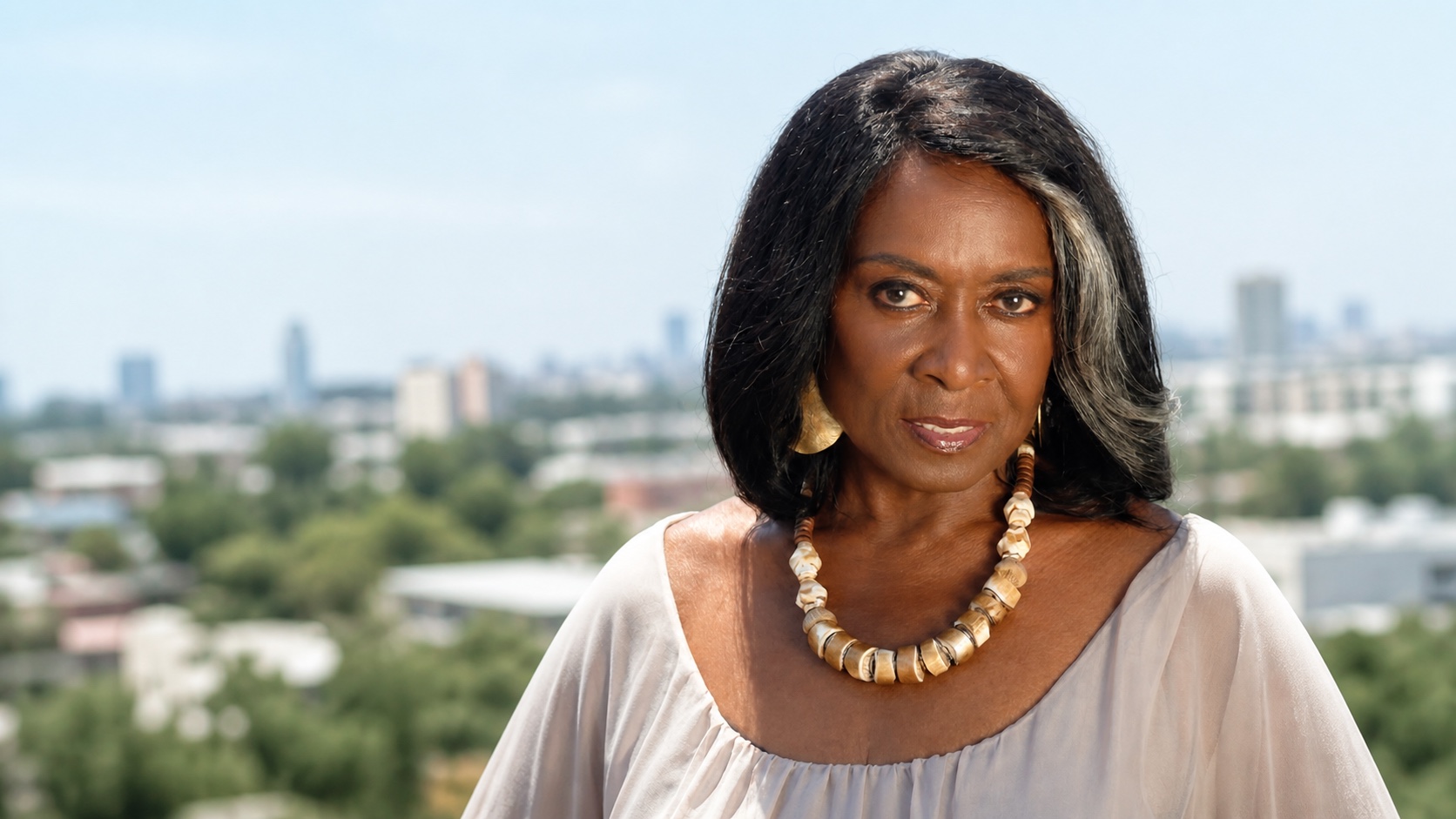 Landscape portrait of Aloma Wright overlooking the city